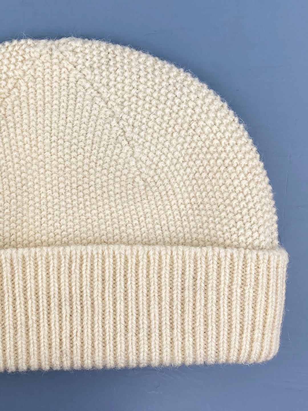 Cuillin hat in undyed natural white British wool.