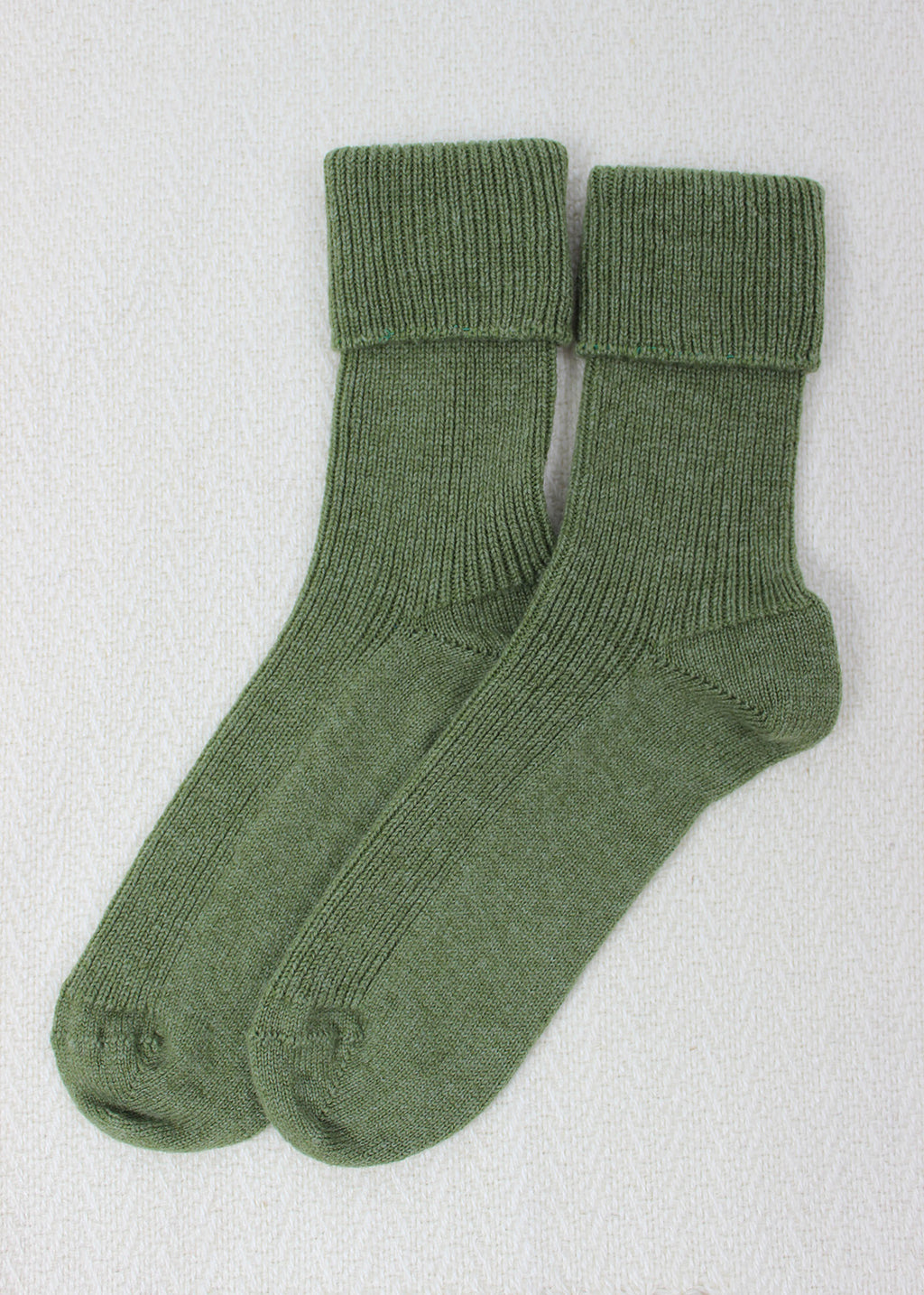 Cashmere bed socks in ivy green.