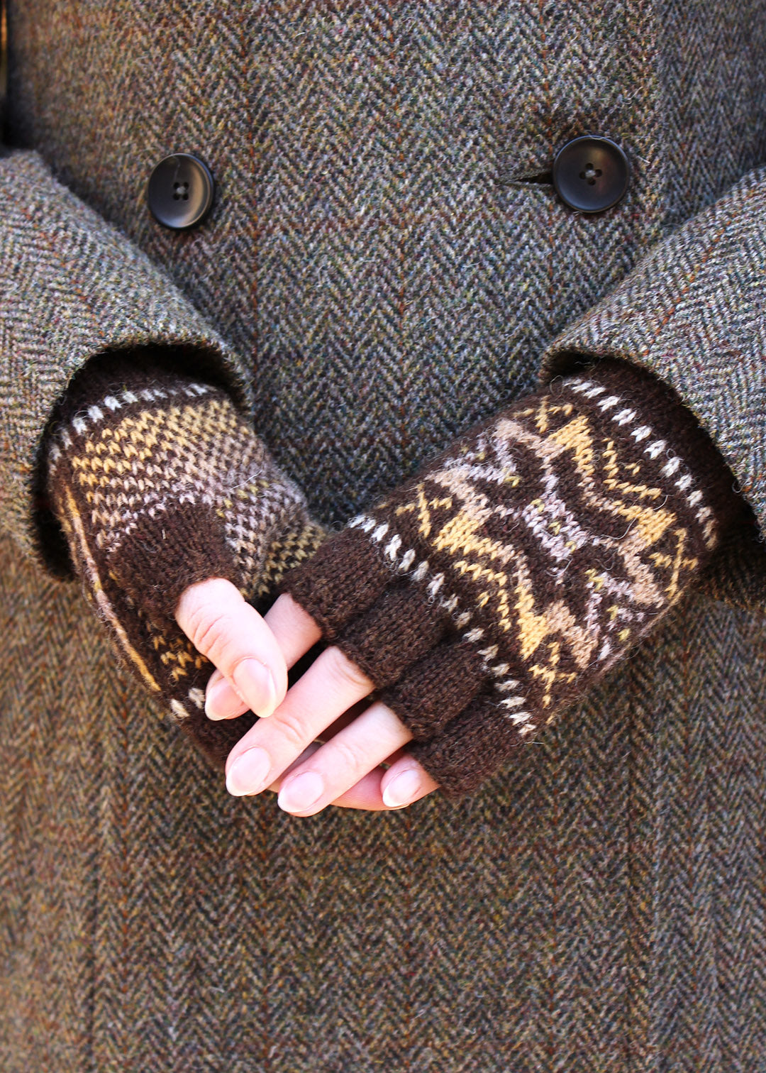 Hand knitted fingerless gloves in cocoa brown with Fair Isle pattern.