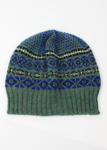 Hand knitted Fair Isle beanie hat in sea green with royal blue details.