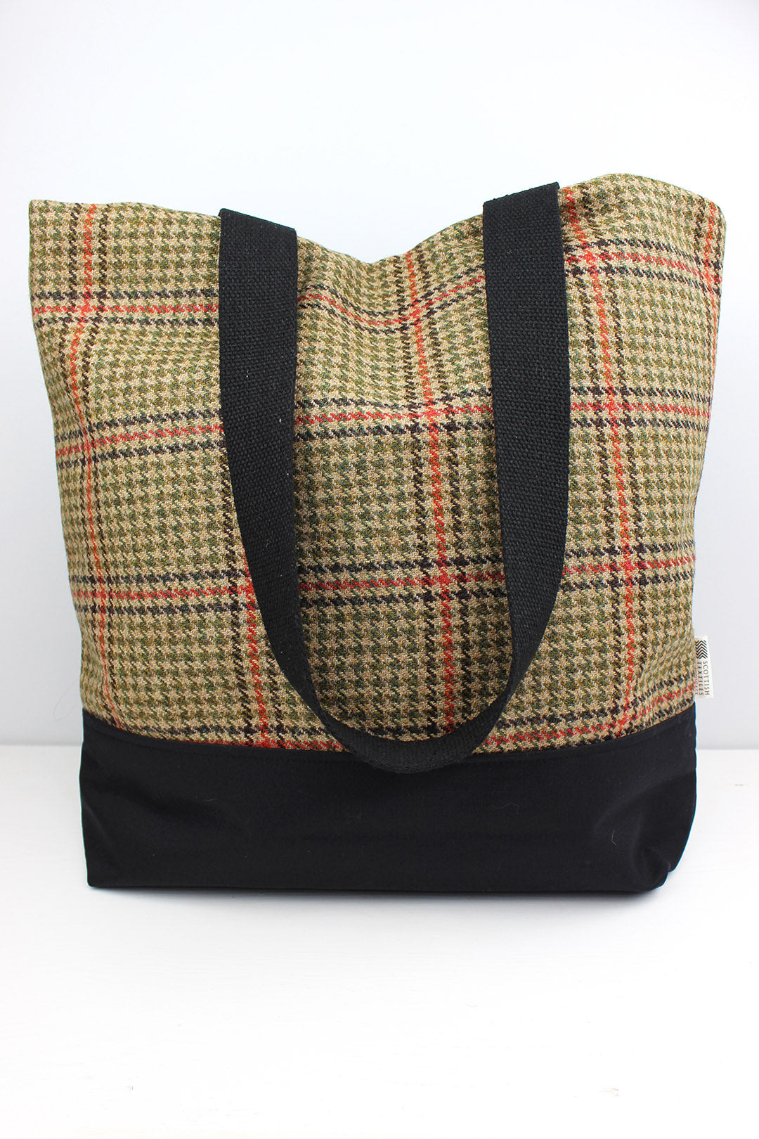 stylish and sustainably made green and orange check tweed shopper bag is perfect for laptops, books, shopping