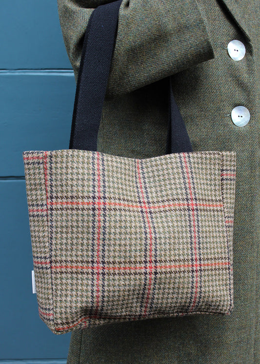 Stylish and sustainably made square tote bag in a houndstooth check tweed with a sturdy black strap.