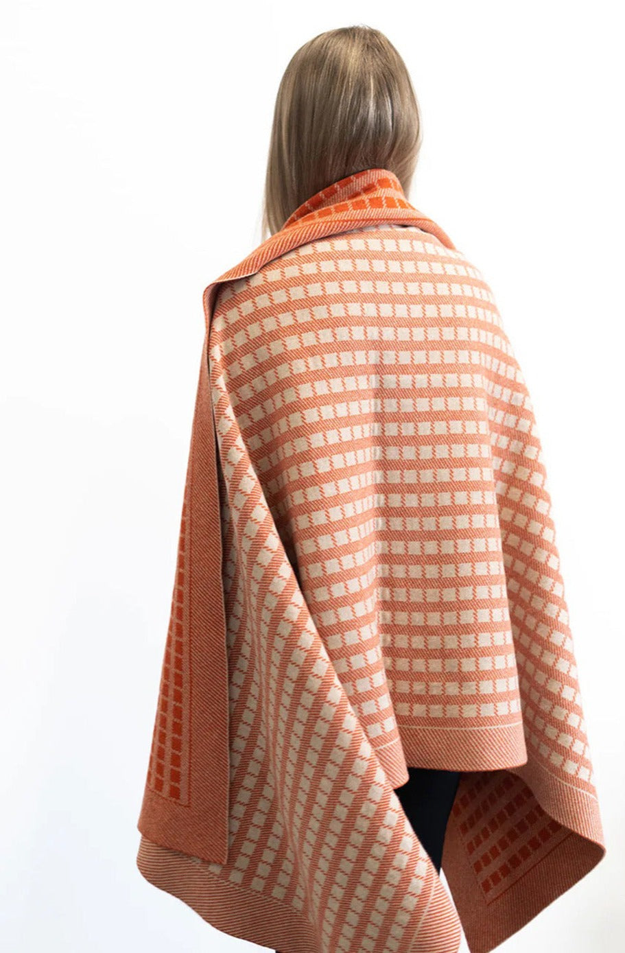 Jacquard knit blanket in furnace Inspired by timeless weave structures and knitted in Ayrshire in sumptuously soft lambswool by Hilary Jane Keyes.