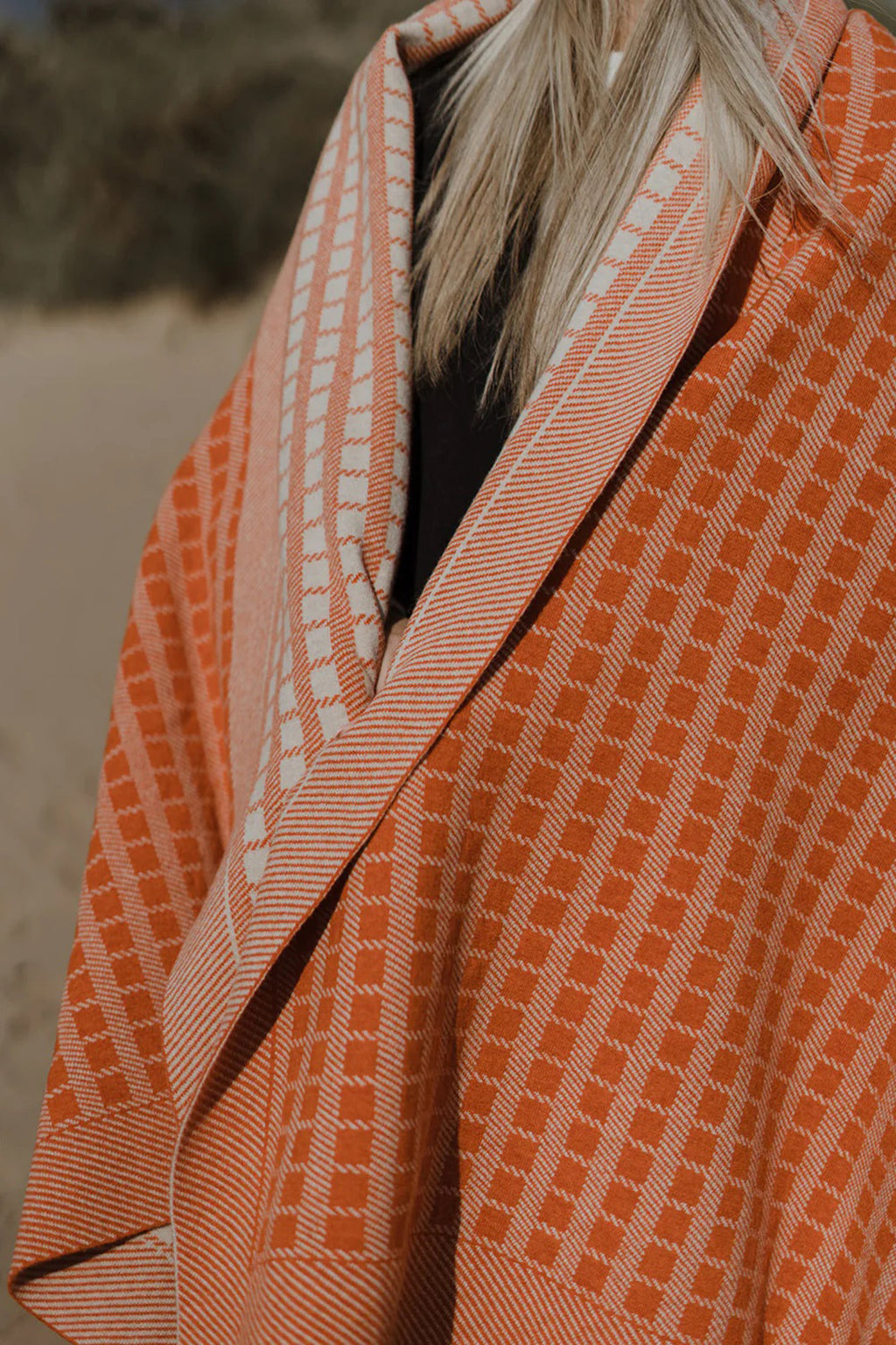 Jacquard knit blanket in furnace Inspired by timeless weave structures and knitted in Ayrshire in sumptuously soft lambswool by Hilary Jane Keyes.