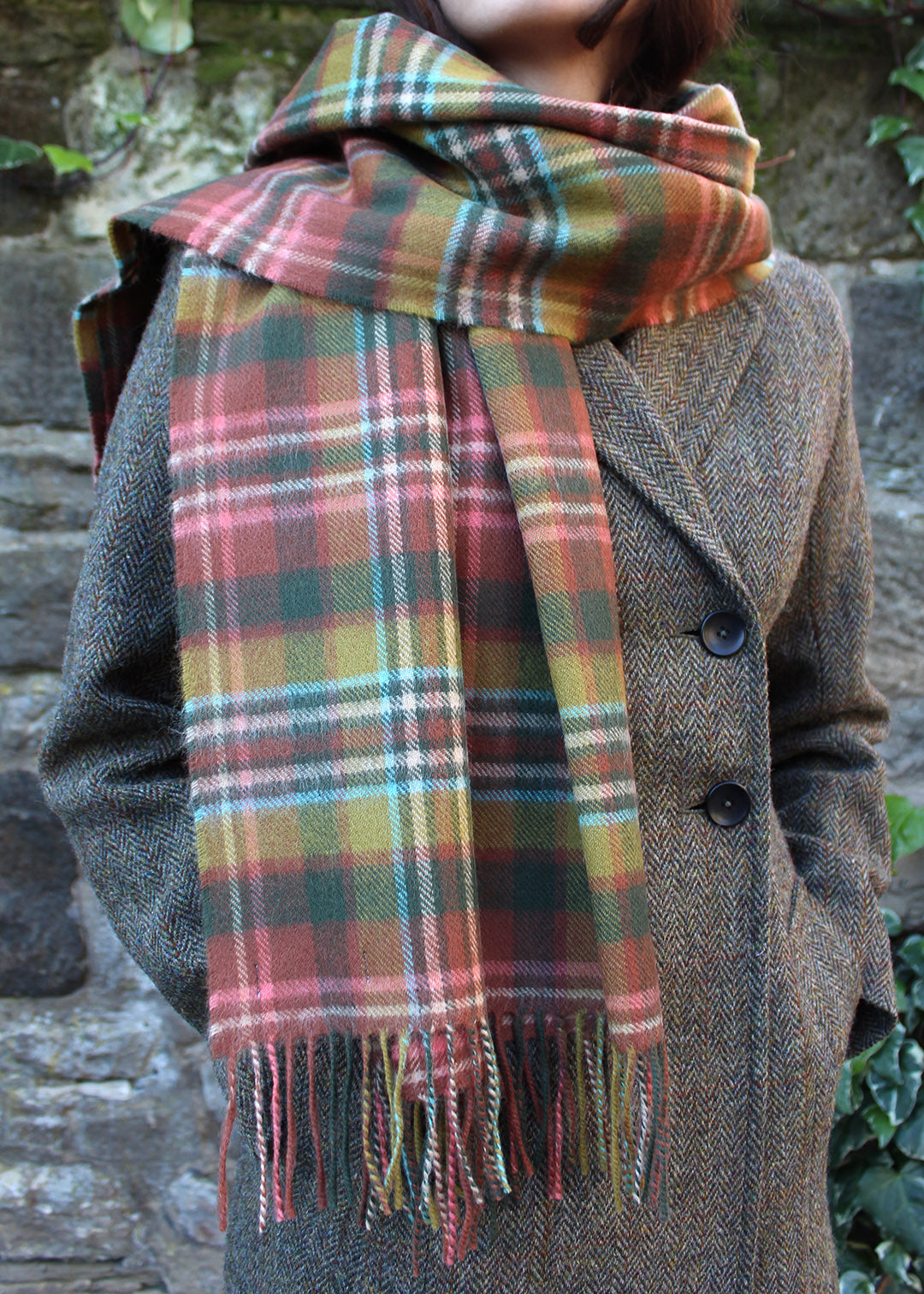 Tartan lambswool blanket scarf in harmonious shades of pink, green and mustard.