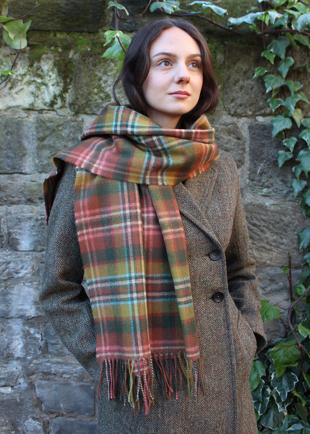 Tartan lambswool blanket scarf in harmonious shades of pink, green and mustard.