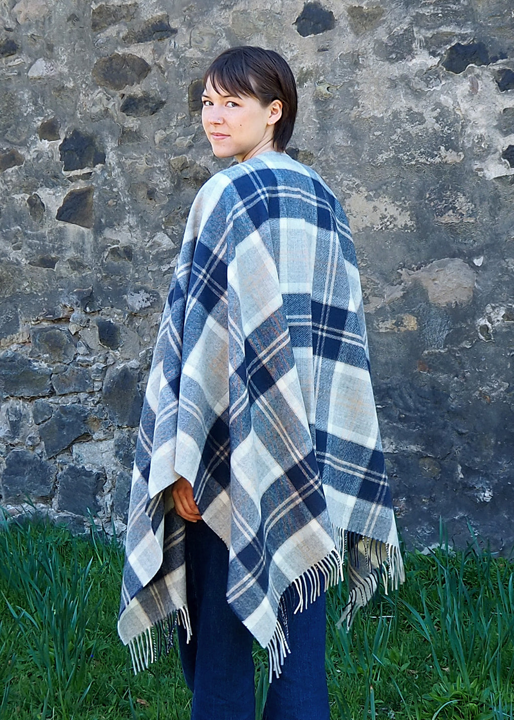 The muted tones in this Bannockbane Grey serape make it easy to wear over any outfit.