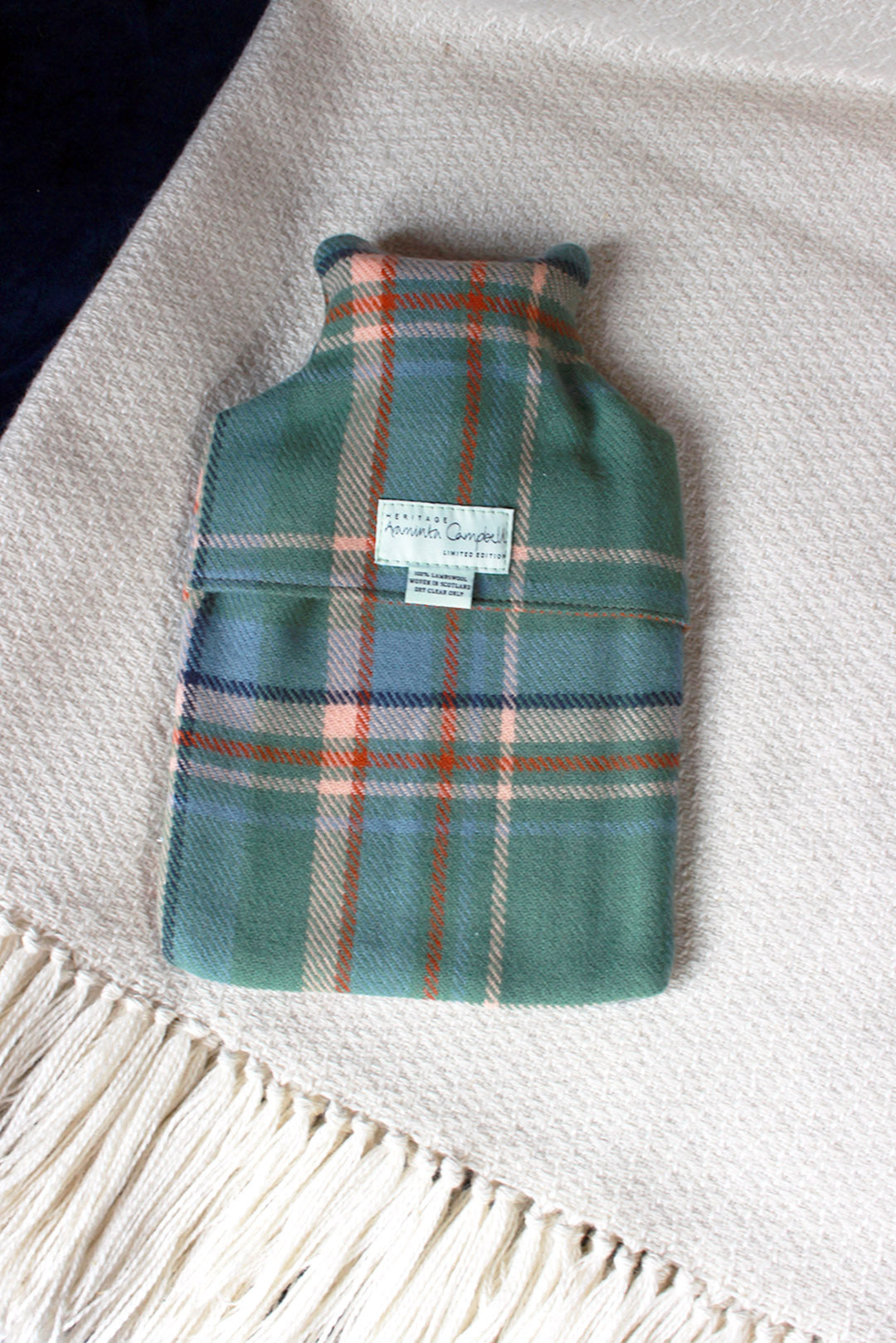 Snuggle up with our limited edition Araminta Campbell Highlands at Dawn tartan hot water bottle