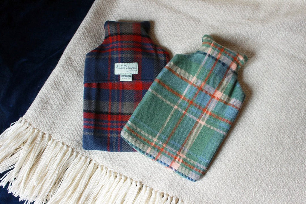Snuggle up with our limited edition Araminta Campbell Highlands at Dawn tartan hot water bottle
