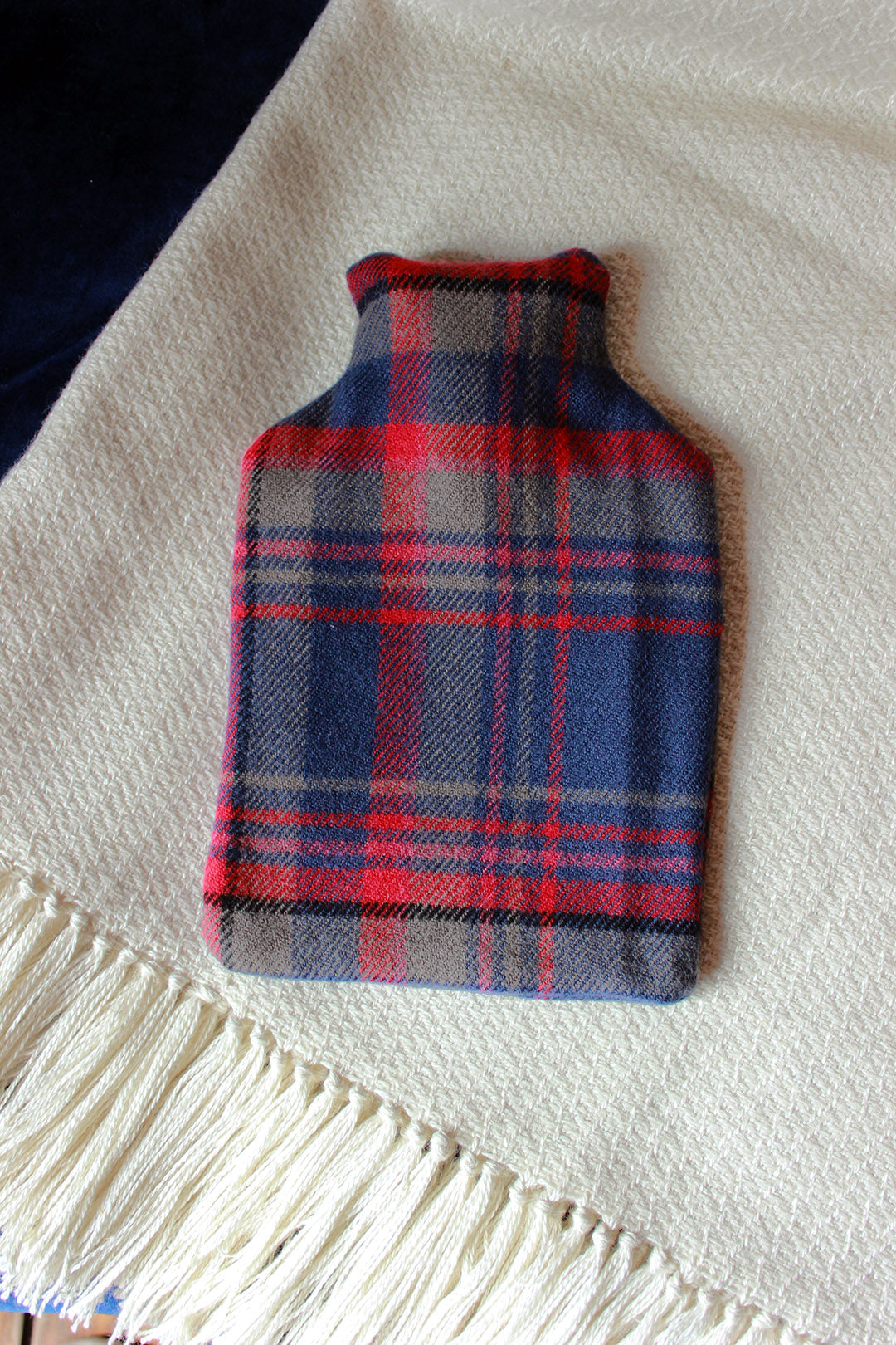 Snuggle up with our limited edition Araminta Campbell Highlands at Dusk tartan hot water bottle