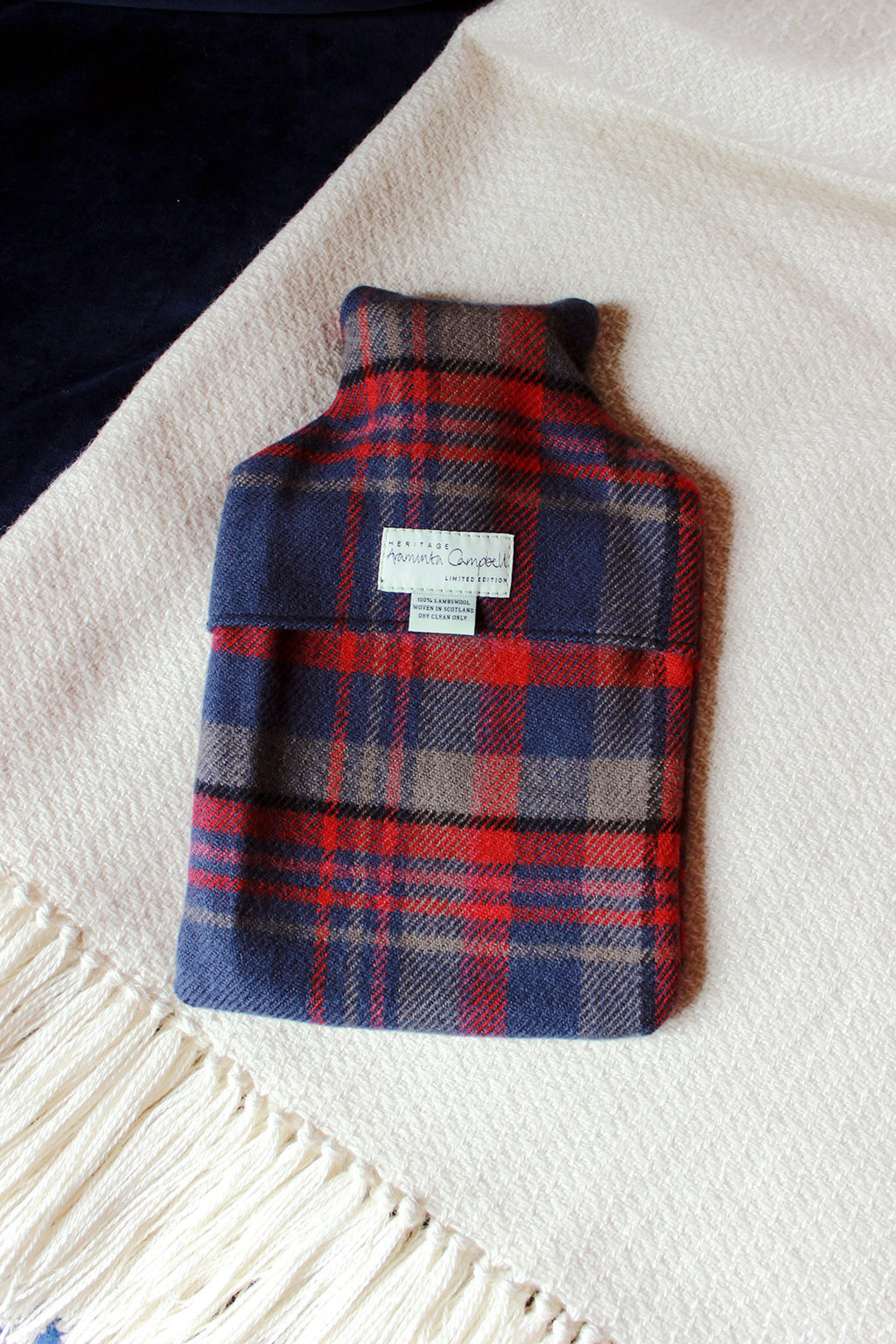Snuggle up with our limited edition Araminta Campbell Highlands at Dusk tartan hot water bottle