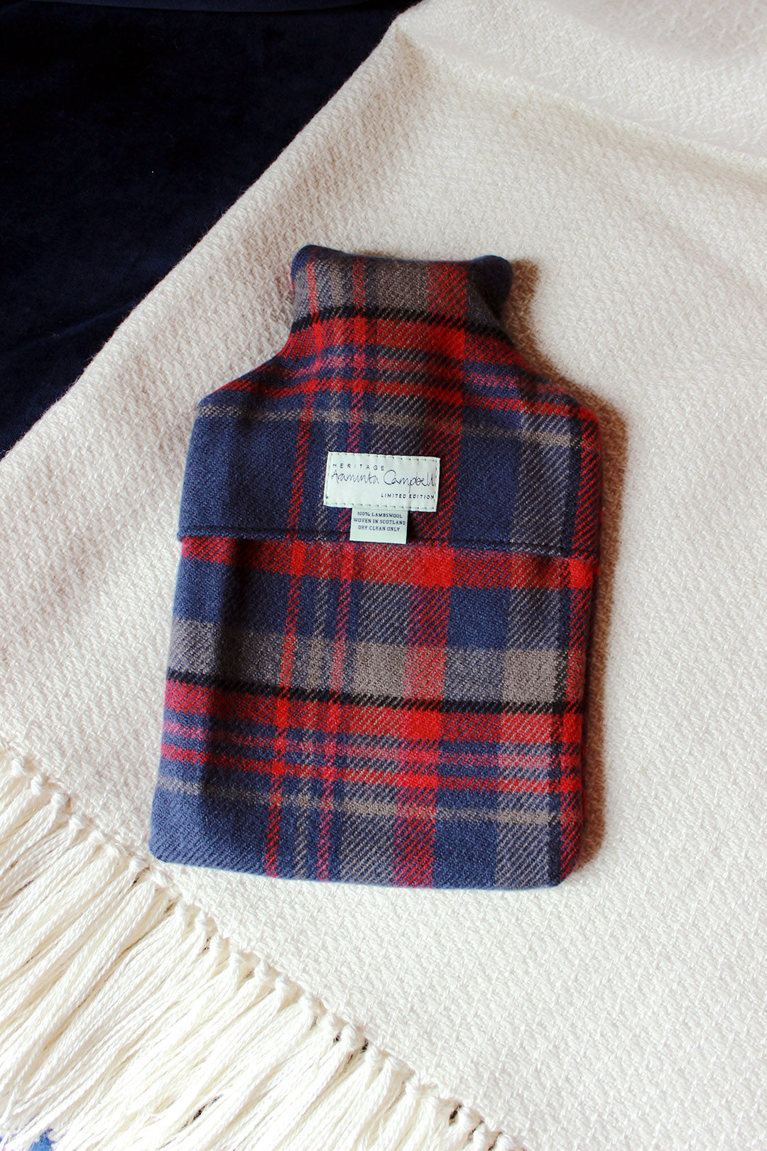 Snuggle up with our limited edition Araminta Campbell Highlands at Dusk tartan hot water bottle
