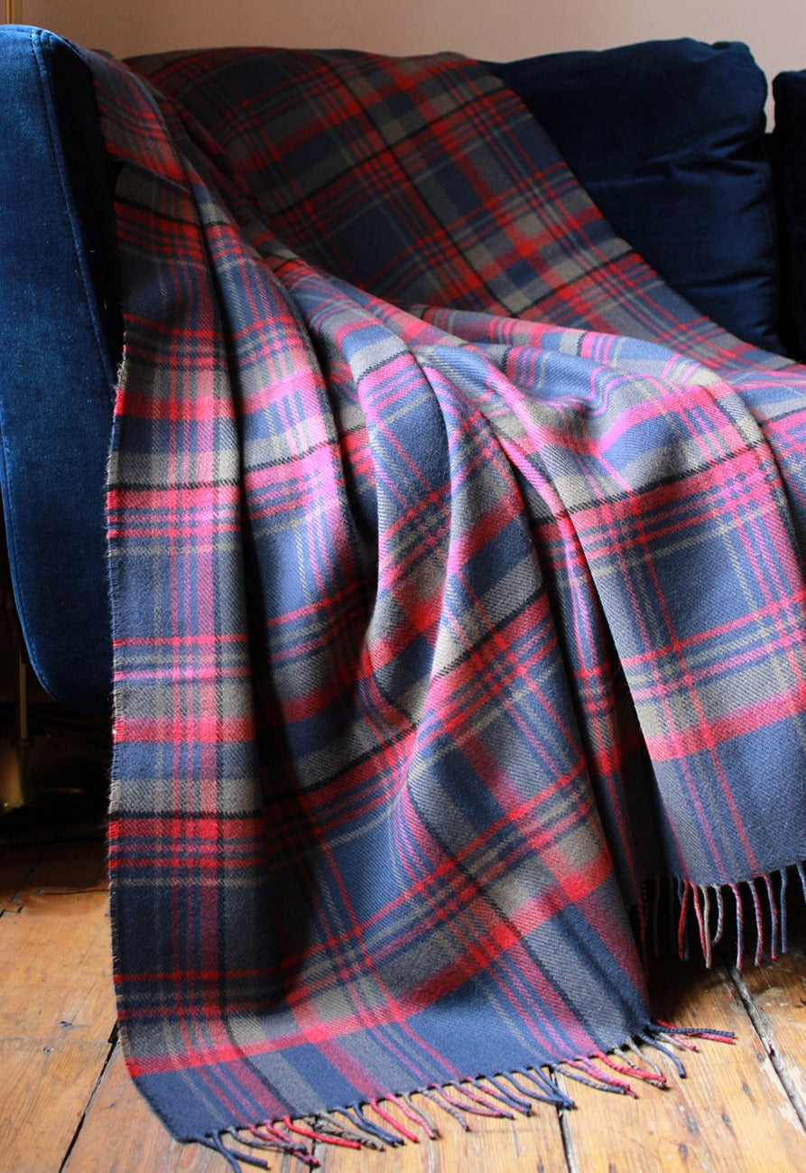 Limited edition Highlands at dusk lambswool blanket features an original plaid design by Araminta Campbell