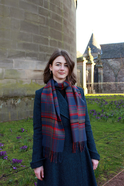 Araminta Campebell Highlands at Dusk woven lambswool scarf with tassels. Woven with muted dusky blue, grey and sunset red. Scottish Textiles Showcase.