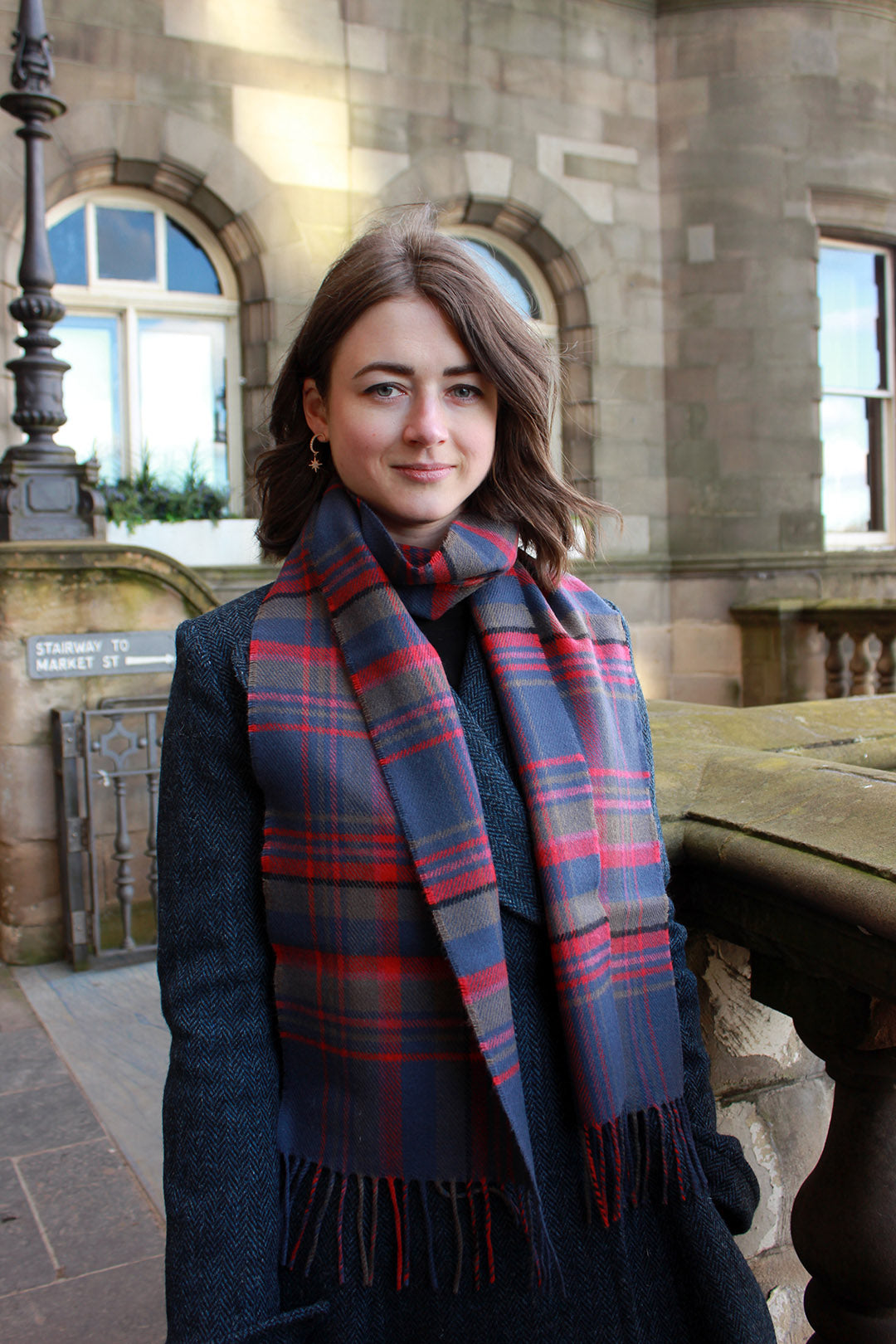 Araminta Campebell Highlands at Dusk woven lambswool scarf with tassels. Woven with muted dusky blue, grey and sunset red. Scottish Textiles Showcase.