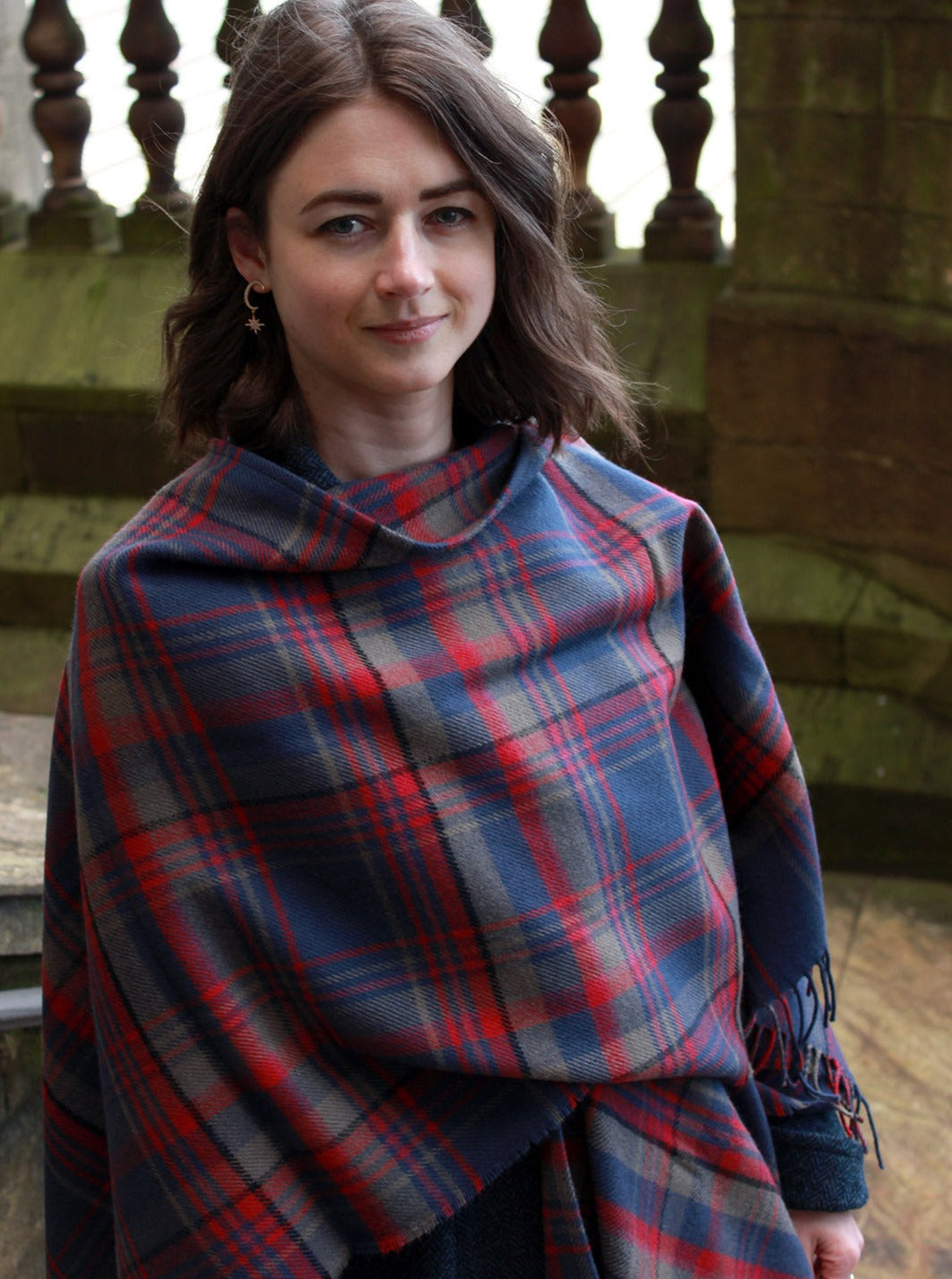 Araminta Campebell Highlands at Dusk woven lambswool serape with tassels. Woven with muted dusky blue, grey and sunset red. Scottish Textiles Showcase.