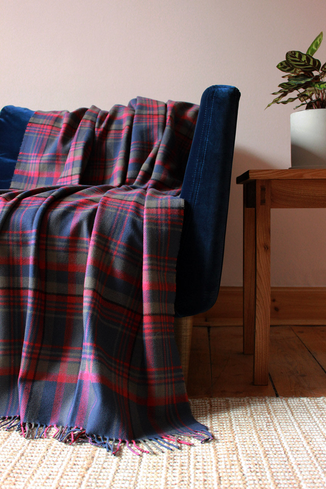 Limited edition Highlands at dusk lambswool blanket features an original plaid design by Araminta Campbell