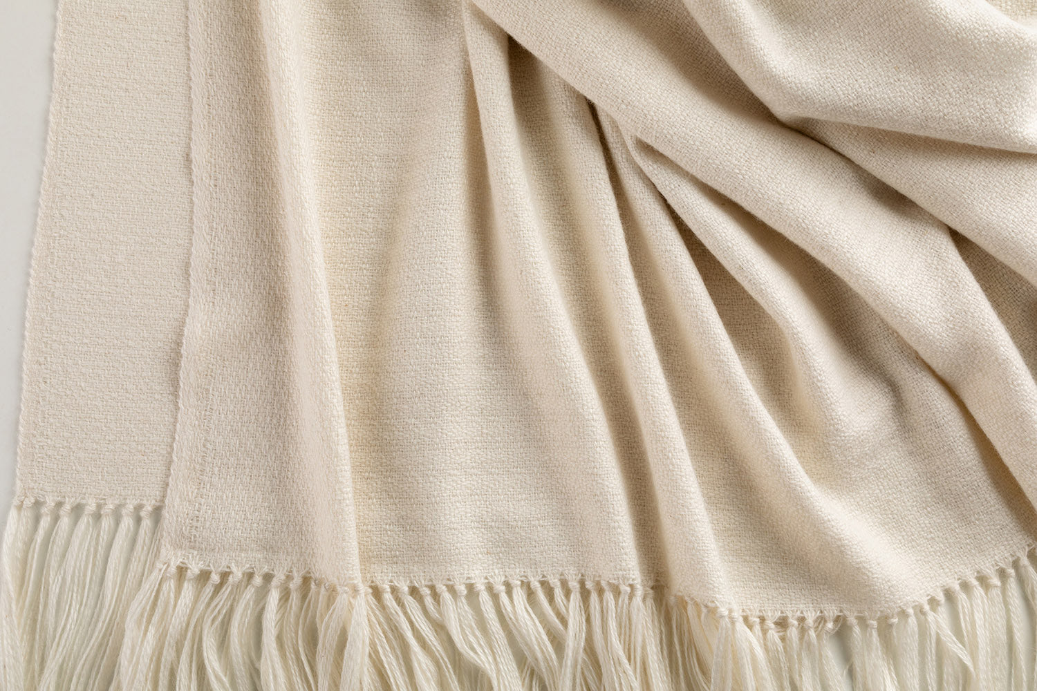 Araminta Campbell alpaca willow throw in natural white at Scottish Textiles Showcase