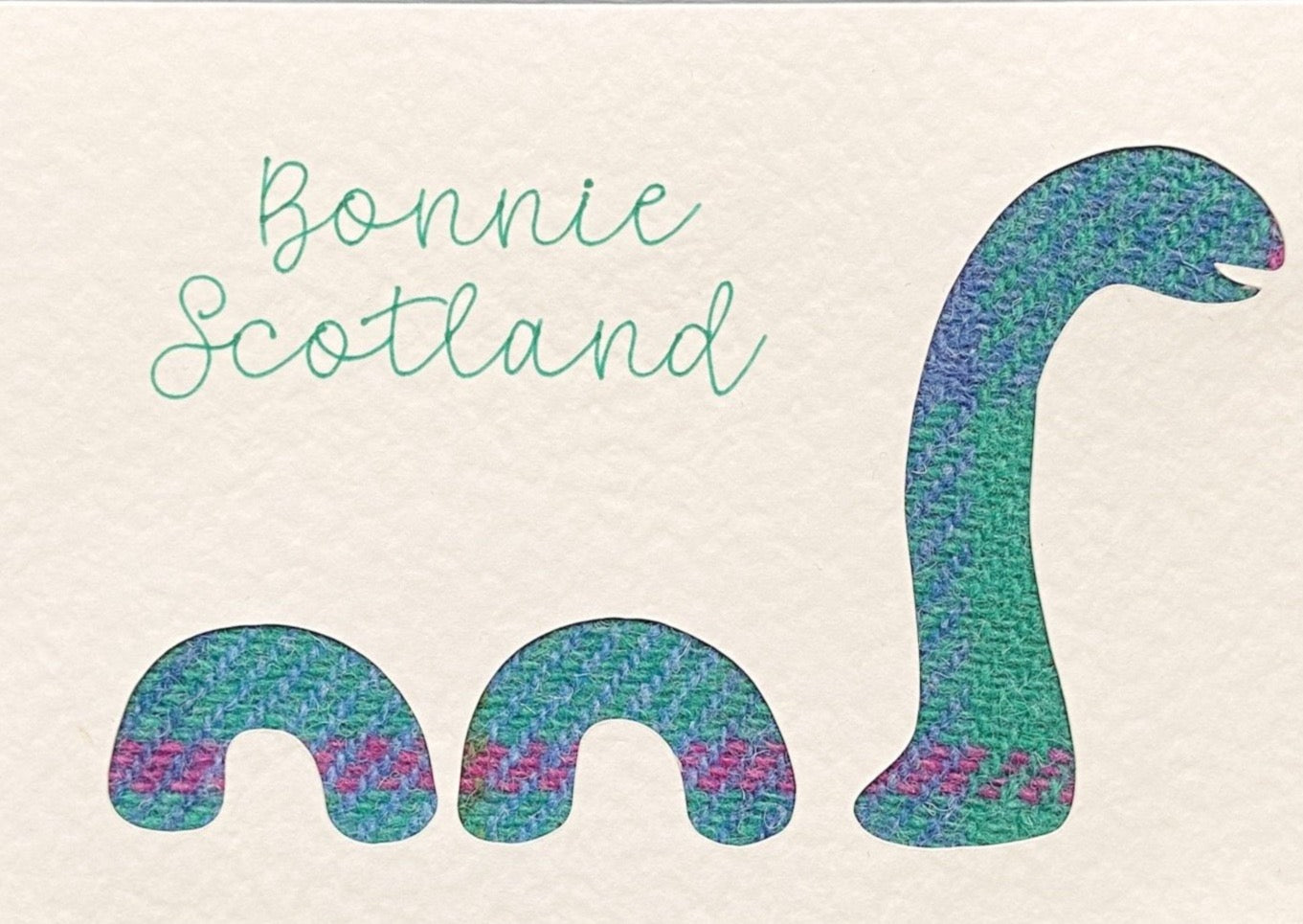 Harris Tweed greetings card with a multicoloured check tweed Nessie. 