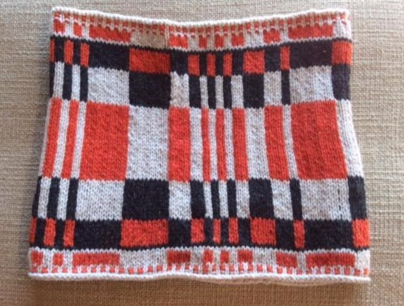 Coda snood knitting pattern with geometric design