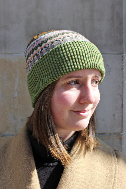 Fairisle wool hat in moss with pink and cream pattern