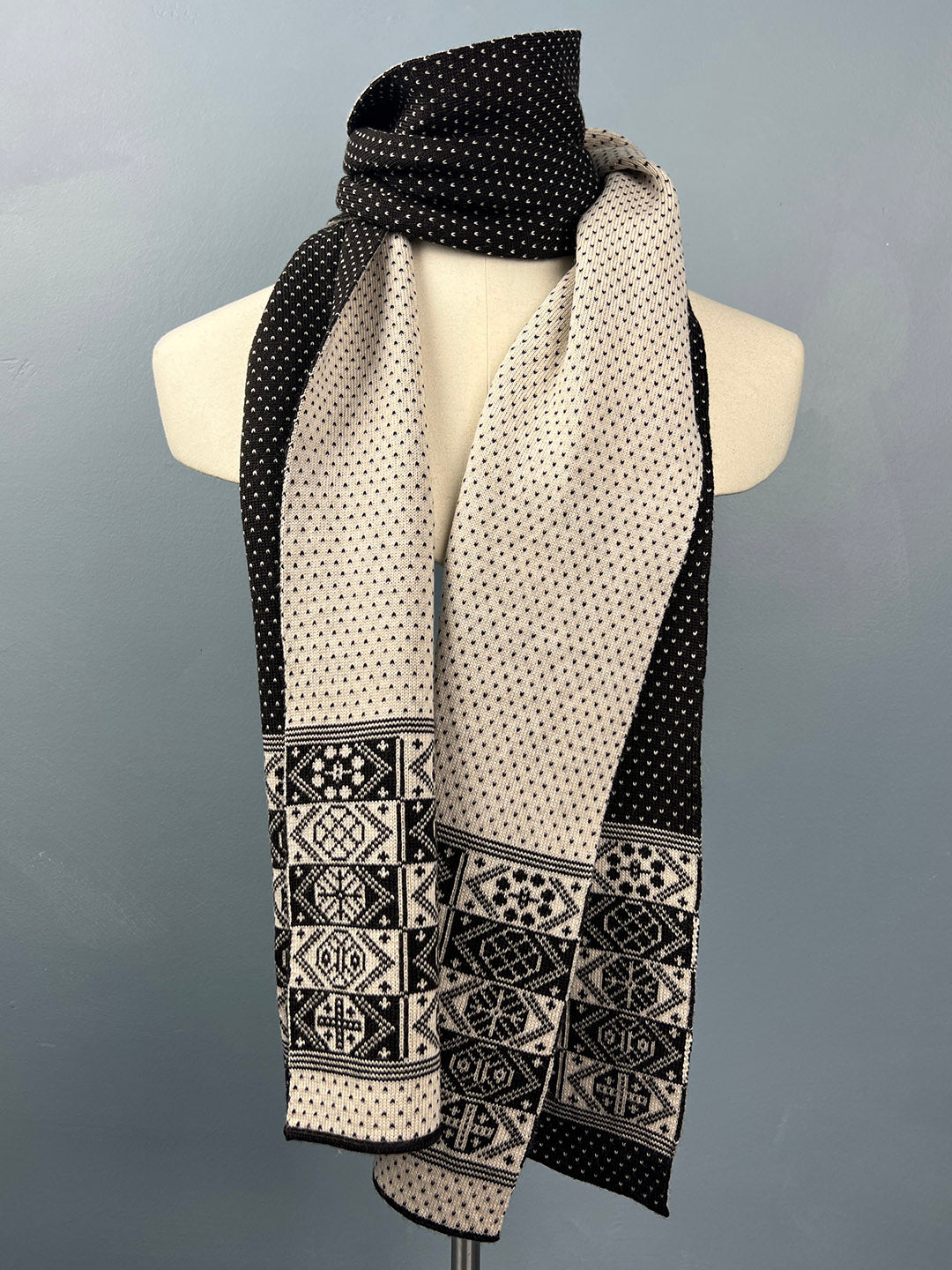 reversible Fair Isle scarf is knitted by BAKKA in superfine merino wool shown on a mannequin bust