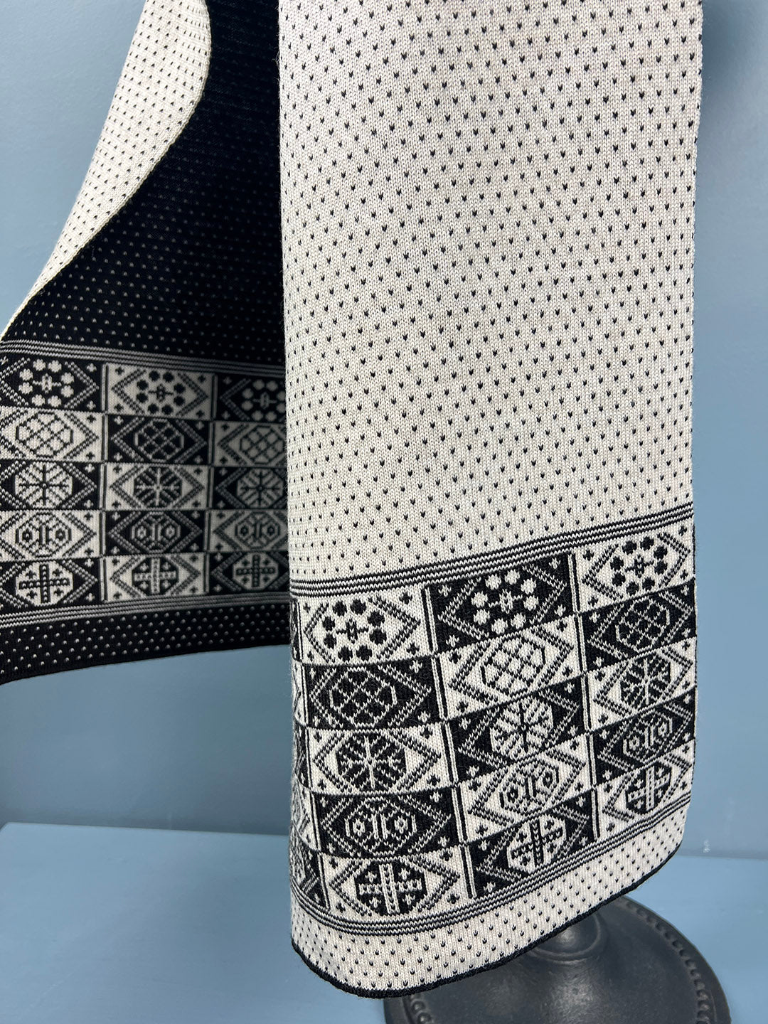 reversible Fair Isle scarf is knitted by BAKKA in superfine merino wool with polka dot pattern