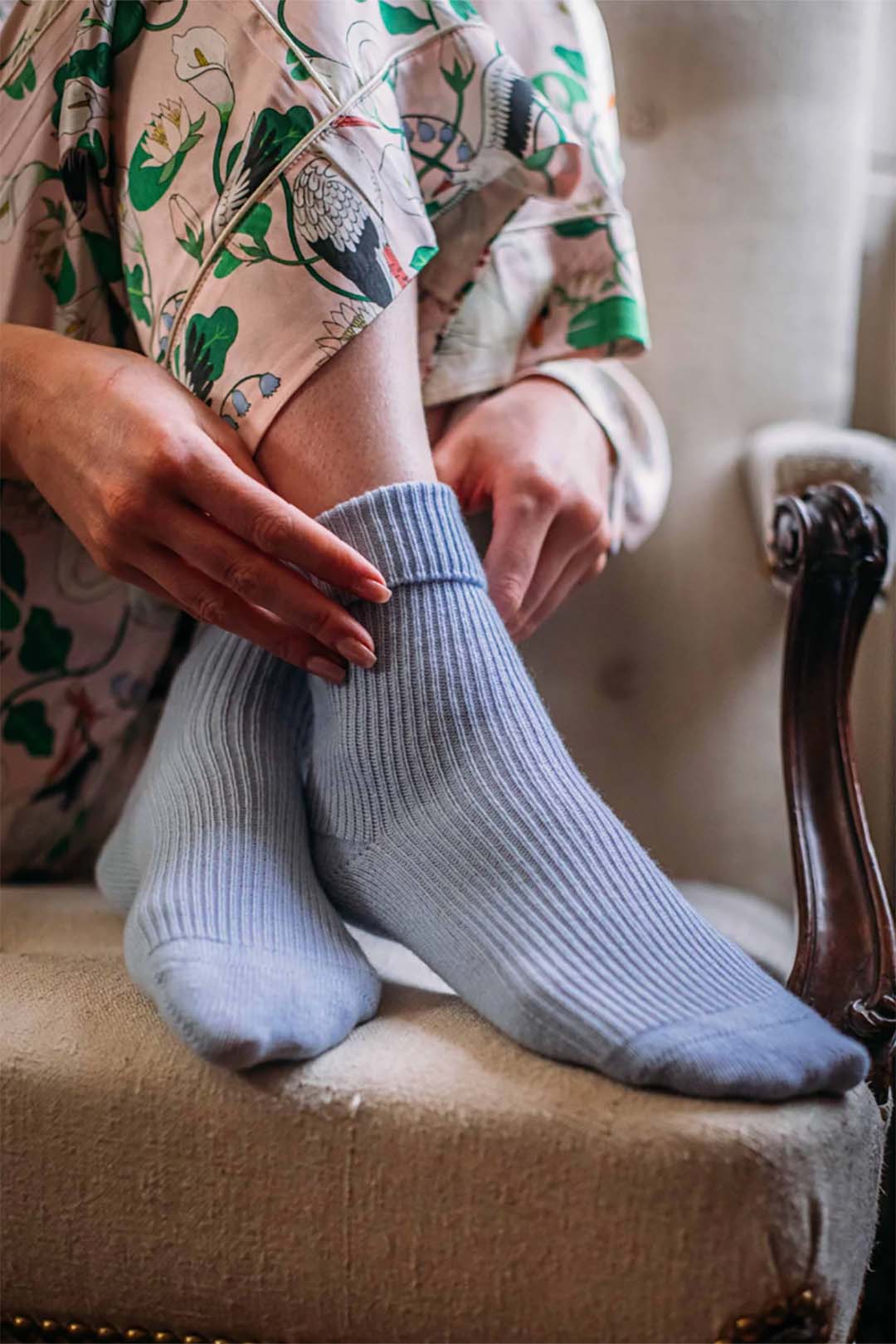 Cashmere bed socks knitted in Scottish Borders in powder blue colour. Scottish Textiles Showcase.