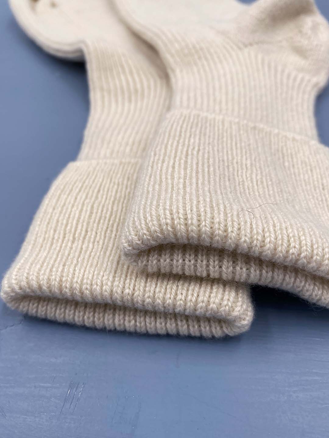 Cashmere bed socks in classic antique white shade designed and made in Scotland