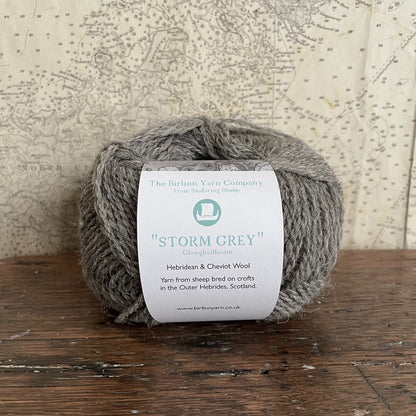 Ball of 4 ply finger weight un-dyed natural yarn from a blend of Hebridean and Cheviot sheep on Berneray. Scottish Textiles Showcase.