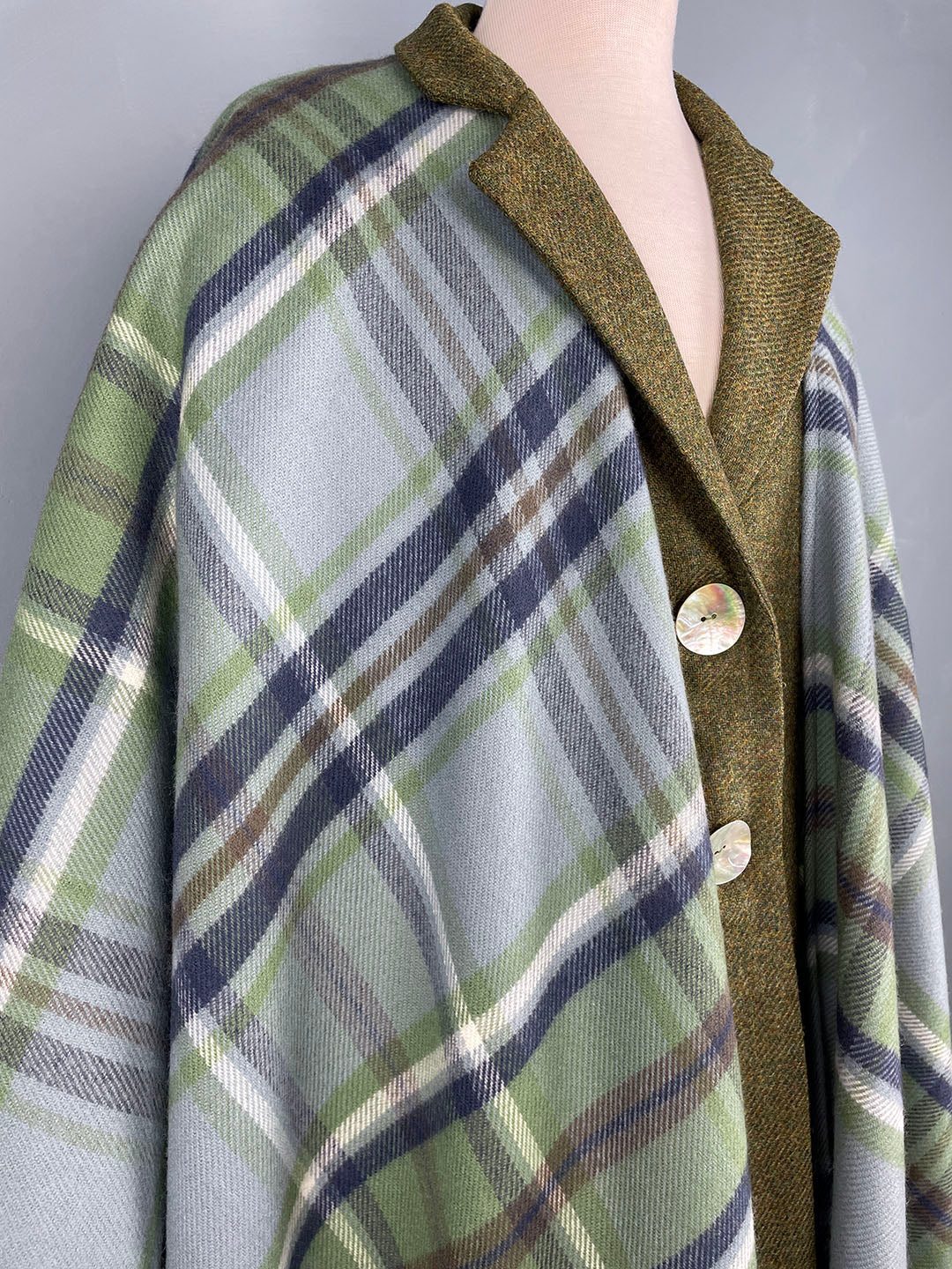 Araminta Campbell heritage tartan wool serape in Beech Dappled Skies, with ivy green coat