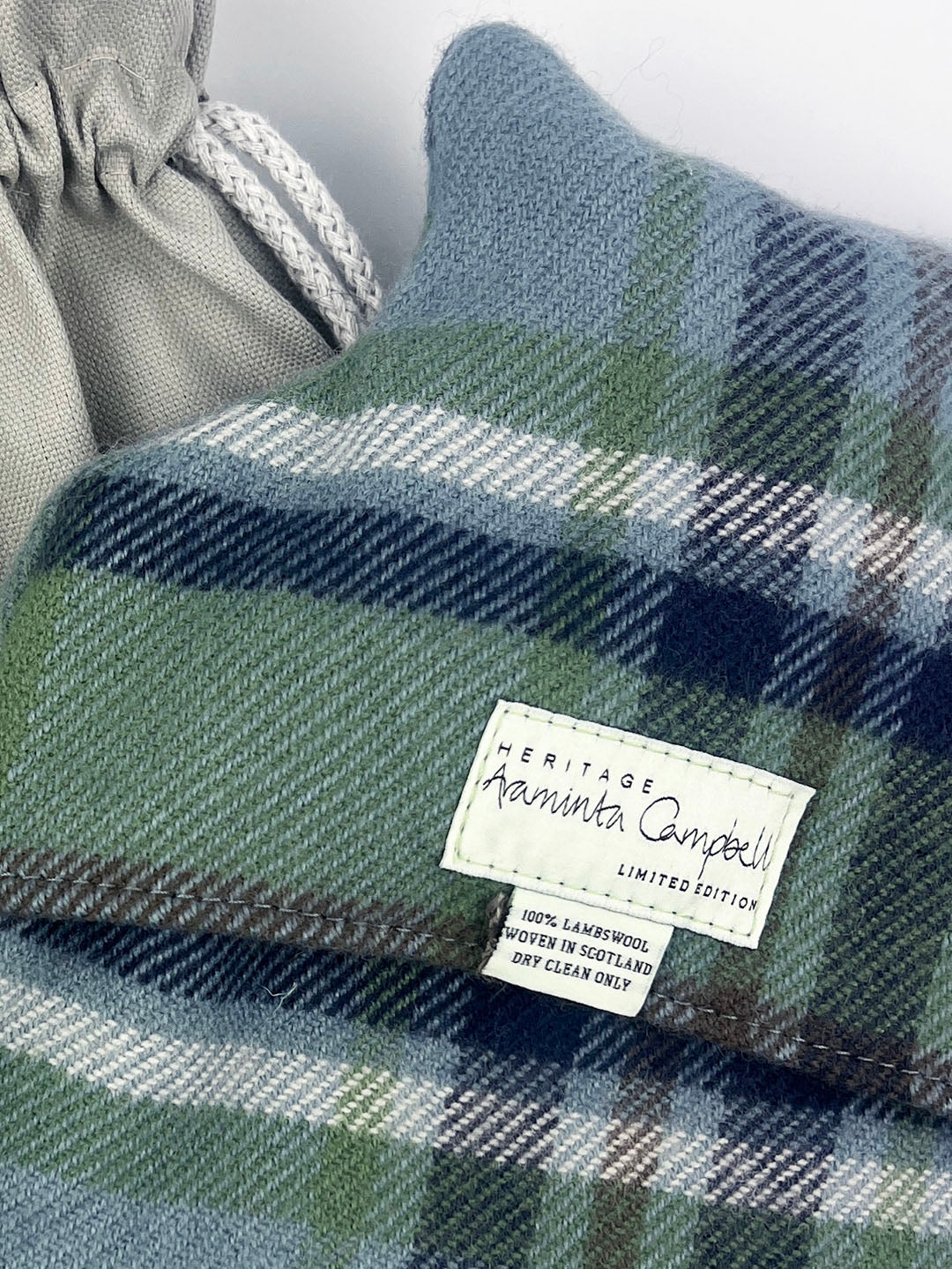 Limited edition Araminta Campbell hot water bottle, woven in 100% lambswool.