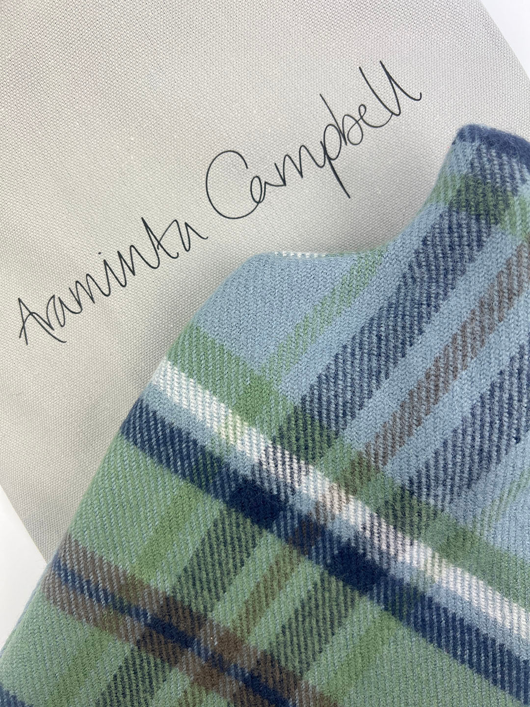 Limited edition Araminta Campbell hot water bottle, woven in 100% lambswool.