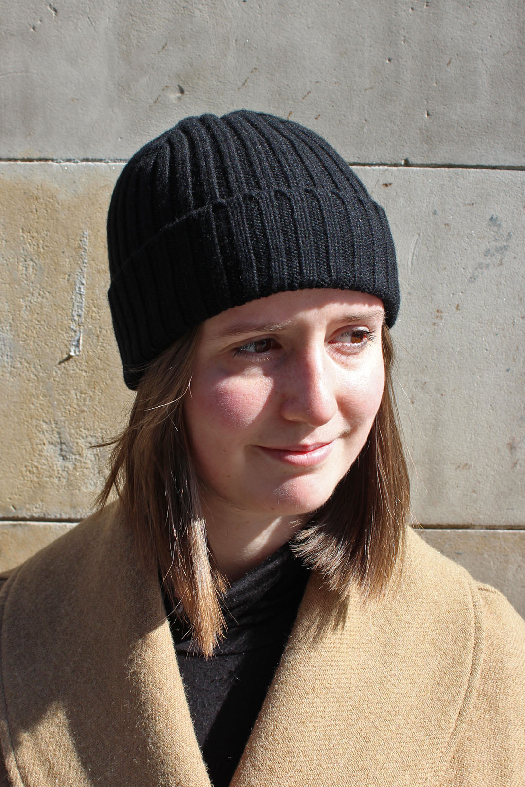 Knitted cairn cashmere hat in black, knitted in scotland