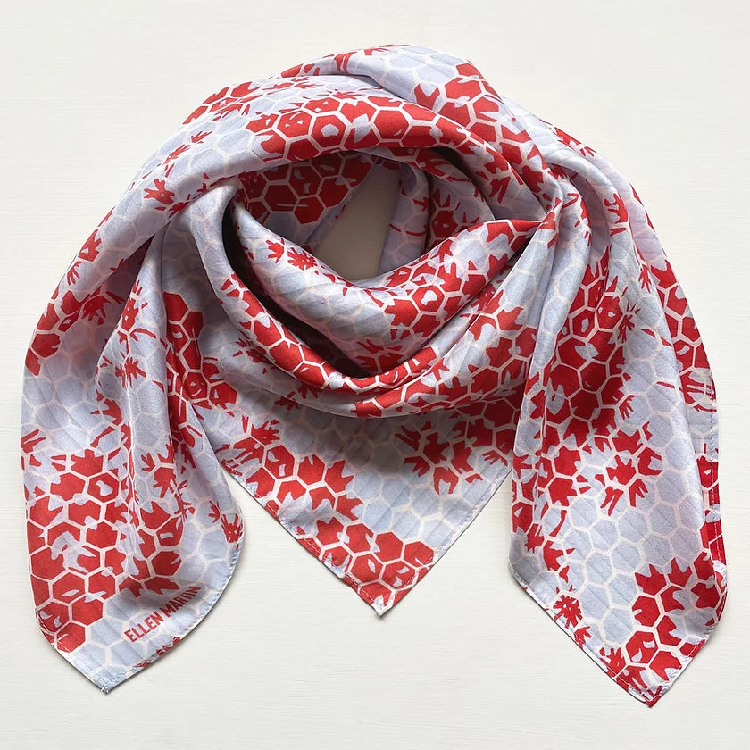 The Kyoto large silk scarf has been digitally printed with a beautiful repeat pattern in red and pale blue.