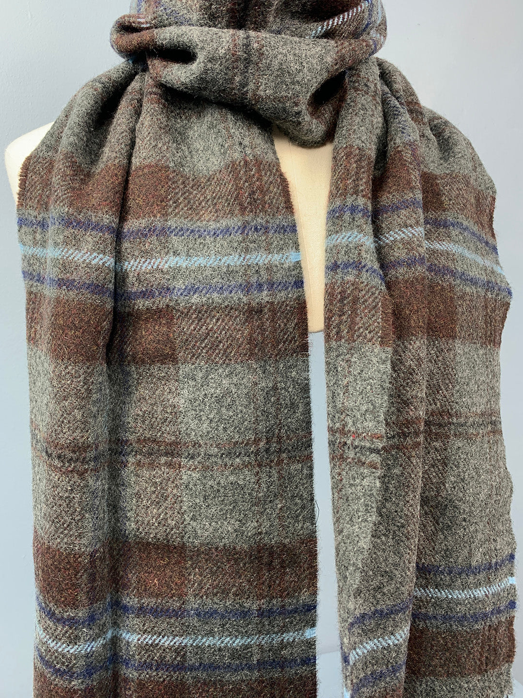 Scottish scarf with brown, blue and dark grey checks