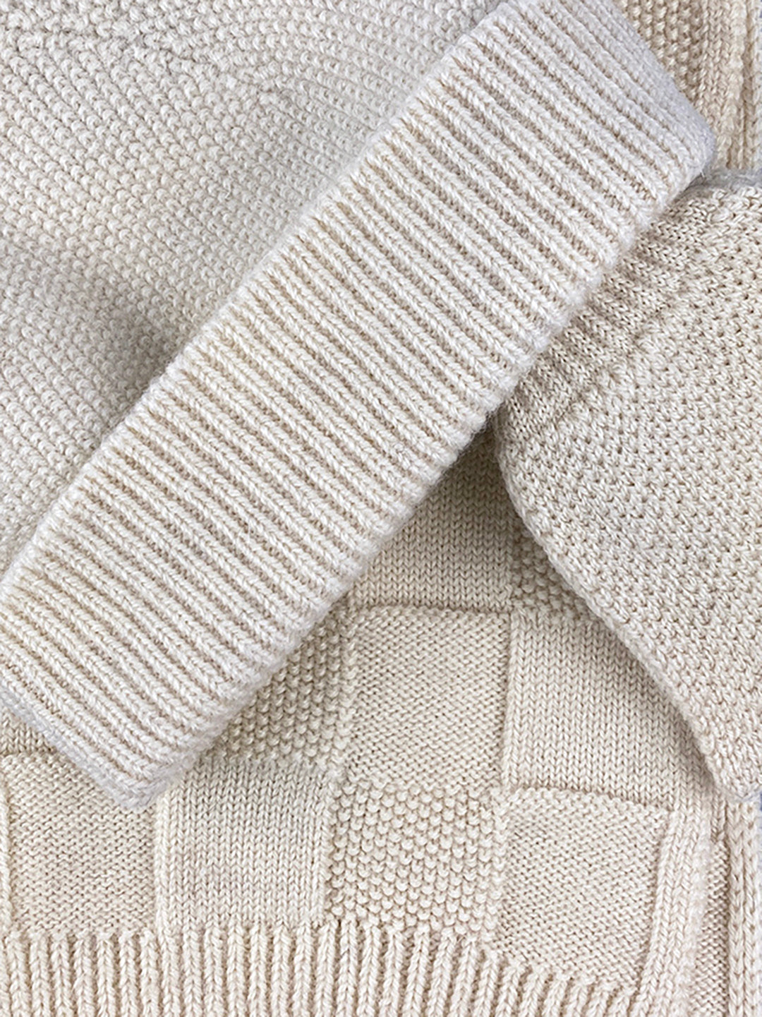Cuillin set natural white undyed british wool knitted in Ayrshire. Scottish Textiles Showcase.