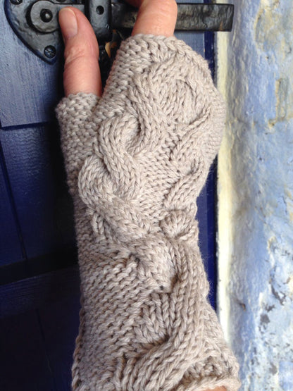 Twisted hazel wristwarmers knitting pattern sample cable knit