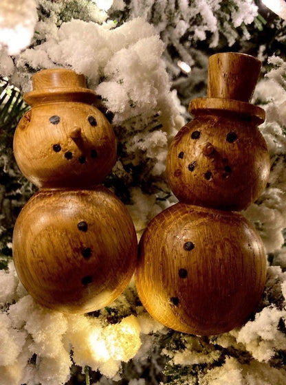 Hand carved wooden snowmen made from scottish Oak. Scottish Textiles Showcase